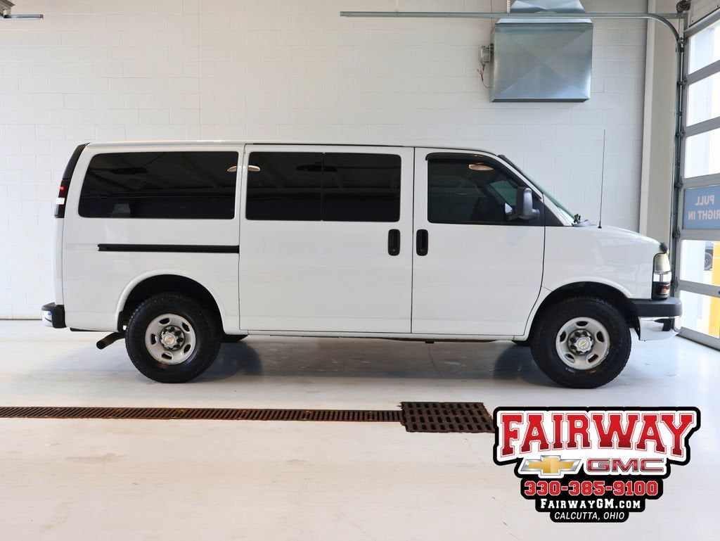 2013 Chevrolet Express Passenger 3500 LT in Summit White — front three-quarter view