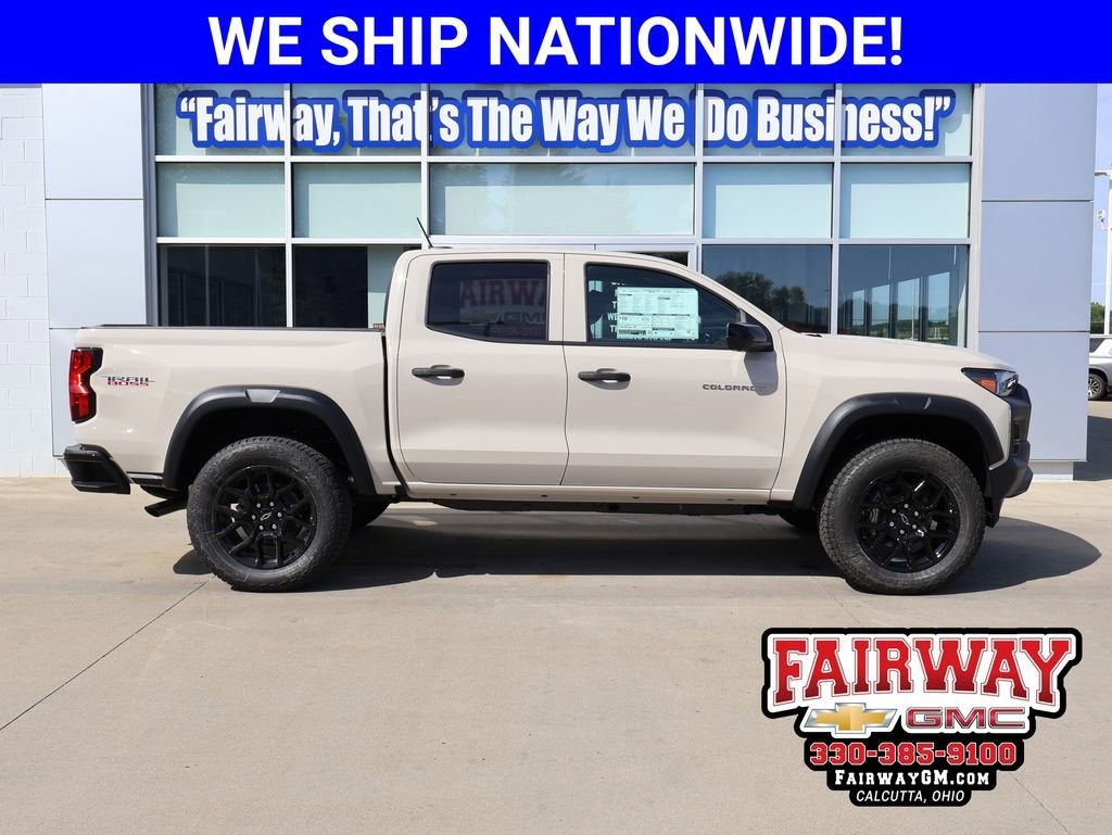 2026 Chevrolet Colorado Trail Boss in White Sands — front three-quarter view