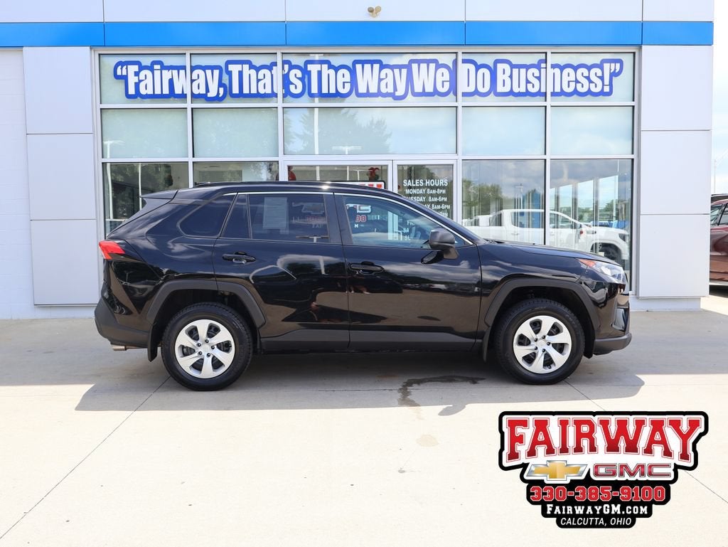 2020 Toyota RAV4 LE in Black — front three-quarter view
