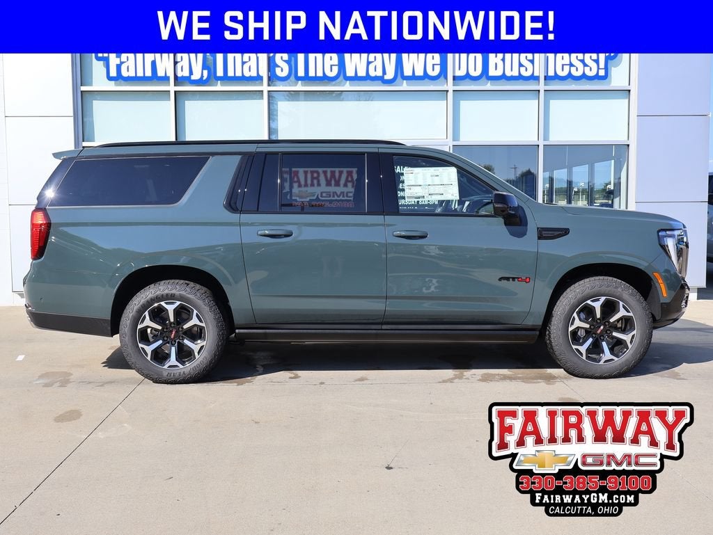 2026 GMC Yukon XL AT4 in Midnight Pine — front three-quarter view