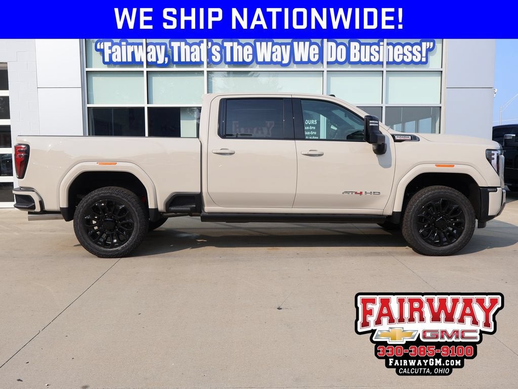 2026 GMC Sierra 2500 HD AT4 in Coastal Dune — front three-quarter view