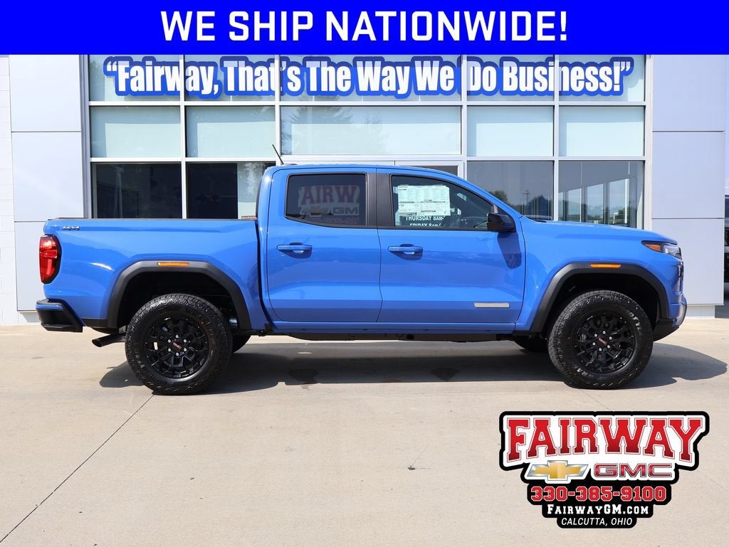 2026 GMC Canyon Elevation in Rapids Metallic — front three-quarter view