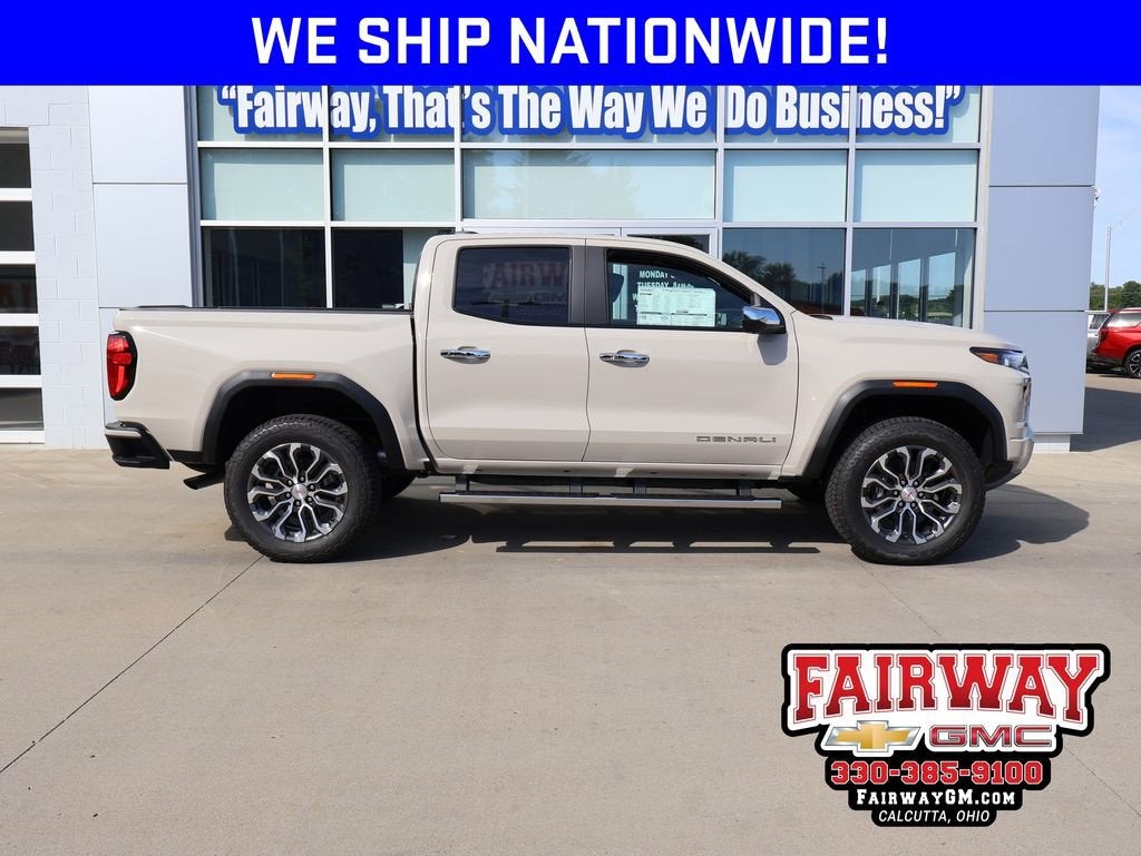 2026 GMC Canyon Denali in Coastal Dune — front three-quarter view