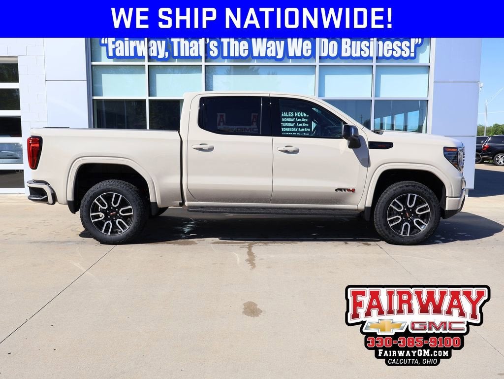 2026 GMC Sierra 1500 AT4 in Coastal Dune — front three-quarter view