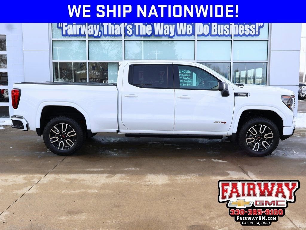 2026 GMC Sierra 1500 AT4 in Summit White — front three-quarter view
