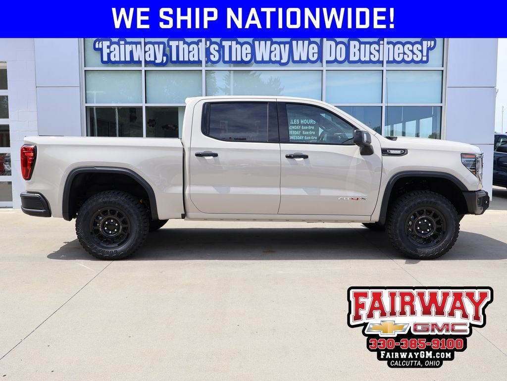 2026 GMC Sierra 1500 AT4X in Coastal Dune — front three-quarter view