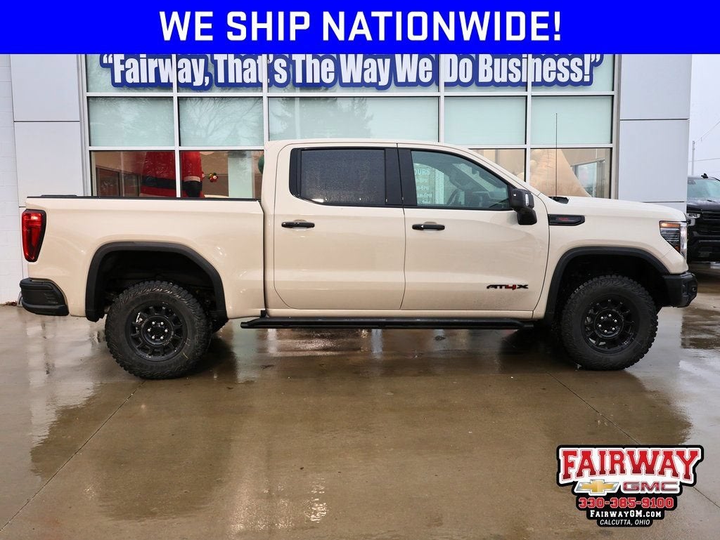2026 GMC Sierra 1500 AT4X in Coastal Dune — front three-quarter view